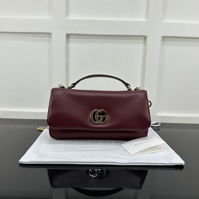 G*u*i top handle bags